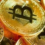 bitcoin_BTC_koers_breekt_uit_en_vormt_nieuwe_yearly_high_op_9812_dollar