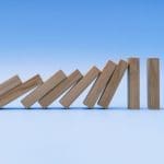 Verdere daling bitcoin koers kan domino-effect veroorzaken