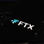 FTX logo op telefoon
