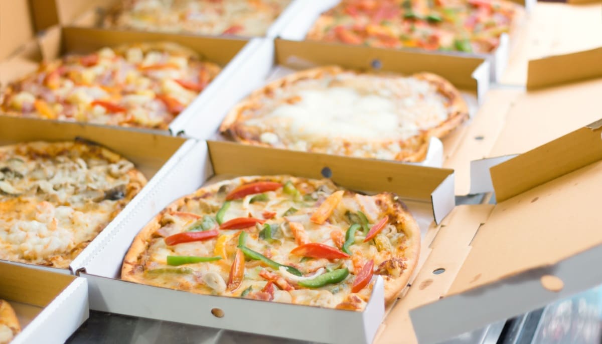 Coinbase laat met grote stapel pizza's de kracht van bitcoin zien