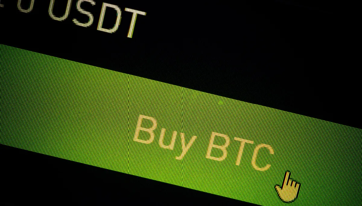 Foto van scherm waarop de knop 'Buy BTC' te zien is