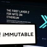 Een afbeelding van het logo cryptomunt immutable, met op de achtergrond de website