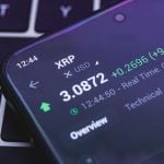 Een afbeelding van de interface van cryptomunt XRP op een cryptobeurs, met een hoge koers en groene cijfers