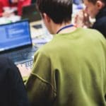 trader hacker laptop screen man