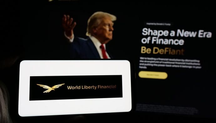 Een afbeelding van het logo en de website van World Liberty Financial, een crypto project en munt van Donald Trump en familie
