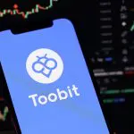 Toobit exchange telefoon koers op achtergrond