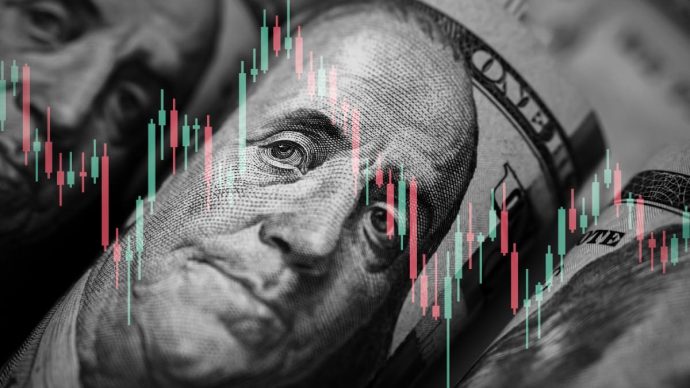 Een afbeelding van Amerikaanse dollars (USD) met daarbij een grafiek van een koers van een aandeel of crypto