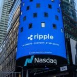 Een afbeelding van Ripple op de Nasdaq, een enorme handelsbeurs. Ripple is het bedrijf achter cryptos zoals XRP en RLUSD
