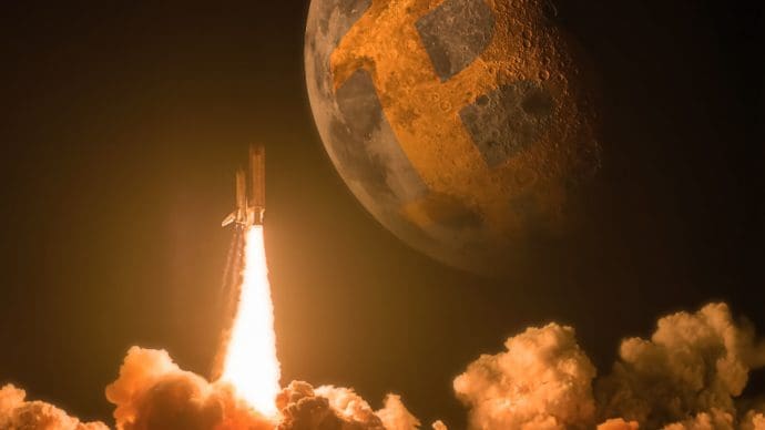 Een afbeelding van een raket die naar de maan gaat, met daarop een vaag bitcoin logo
