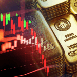 Goudstaven en een dalende koersgrafiek