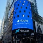 Een afbeelding van het logo van Ripple op de voorkant van de Nasdaq