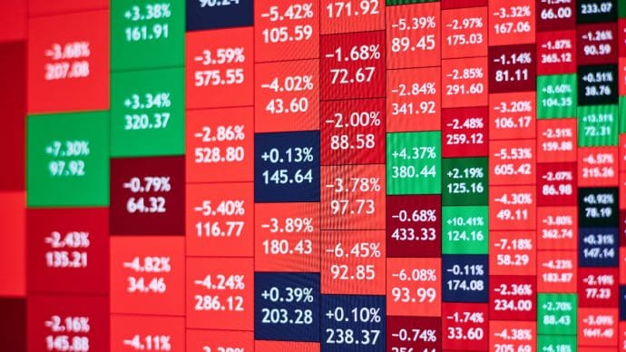 Een afbeelding van verschillende aandelen in een box graph met rode en groene blokken en stijgingen en dalingen, rood, groen