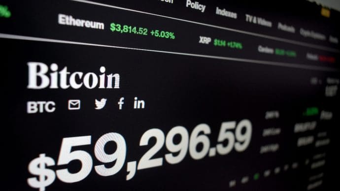 Een afbeelding van een pagina met de koers van bitcoin op 60000 dollar