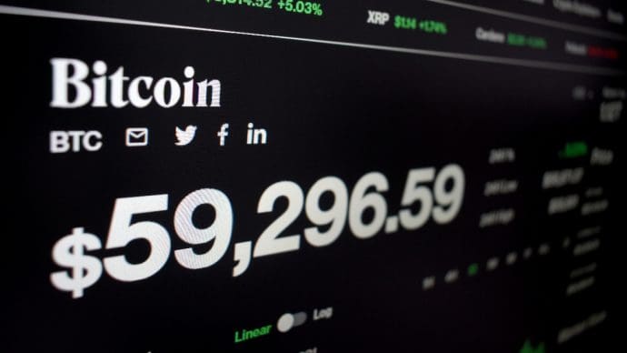 Een afbeelding van de bitcoin koers net onder de 60.000