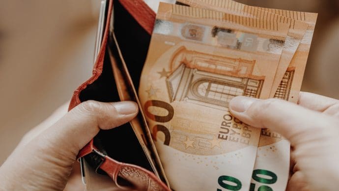 Economen waarschuwen voor nieuwe klap voor de Nederlandse portemonnee